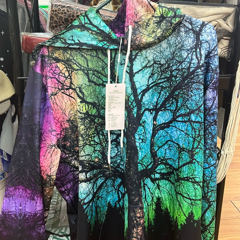 Hoodie with tree at night in bright colors